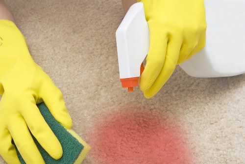 Local cleaner working in a Putney home with practical domestic cleaning tools