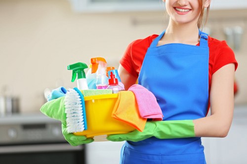 Office cleaners working in a Putney business reception area