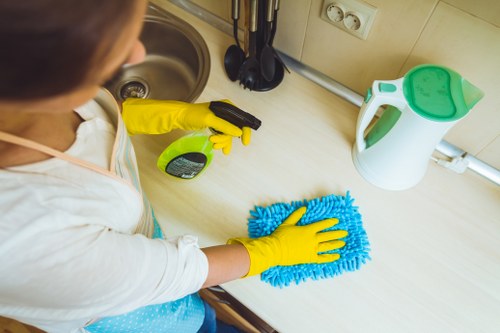Customer choosing a payment method for Oven Cleaning Putney services