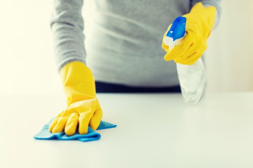 Kitchen floor and nearby surfaces protected during oven cleaning