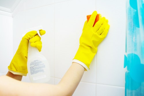 Cleaner preparing a Putney property for a scheduled visit